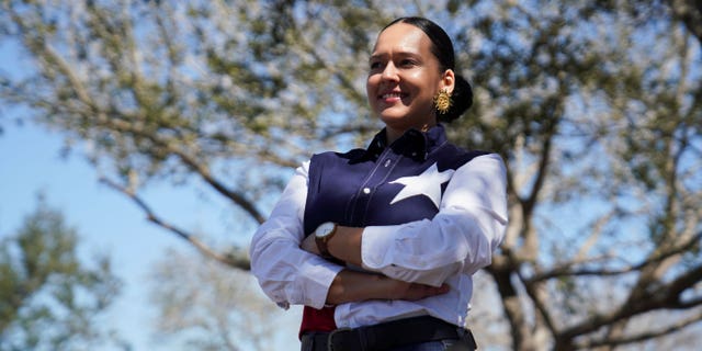 Michelle Vallejo, a progressive democratic candidate for District 15 who was recently endorsed by Elizabeth Warren, poses for a photo at a voting site in McAllen, Texas, March 1, 2022.