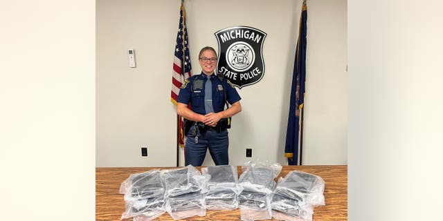 Michigan State Police arrested three people and seized nearly $1 million of cocaine.
