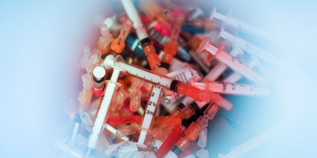 Syringes used for monkeypox vaccine are seen in a bucket at a drive-thru monkeypox vaccination point at Westchester Medical Center in Valhalla, NY, USA, July 28, 2022. 