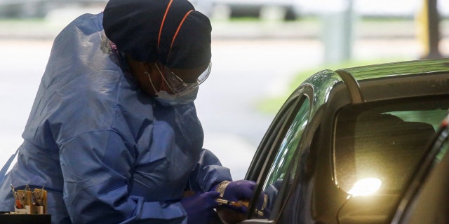 Westchester Medical Center staff receive a monkeypox vaccine at the drive-thru monkeypox vaccination point at Westchester Medical Center in Valhalla, NY, USA, July 28, 2022. 