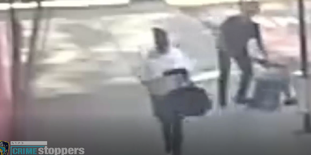 The suspect is later seen walking away while the victim is on the ground.