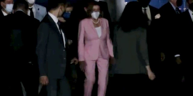 In this image taken from video, House Speaker Nancy Pelosi arrives in Taipei, Taiwan, Tuesday, Aug. 2, 2022. 