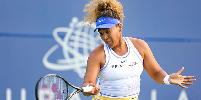 Naomi Osaka of Japan returns a shot from Qinwen Zheng of China during the Mubadala Silicon Valley Classic, part of the Hologic WTA Tour, at Spartan Tennis Complex on August 02, 2022 in San Jose, California. 