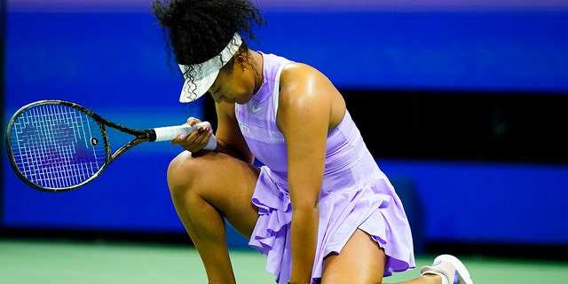 Naomi Osaka, of Japan, reacts after missing a shot during a match against Danielle Collins, of the United States, at the first round of the US Open tennis championships, Wednesday, Aug. 31, 2022, in New York.