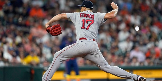 Boston Red Sox starting pitcher Nathan Eovaldi throws against the Houston Astros during the first inning of a baseball game Monday, Aug. 1, 2022, in Houston.