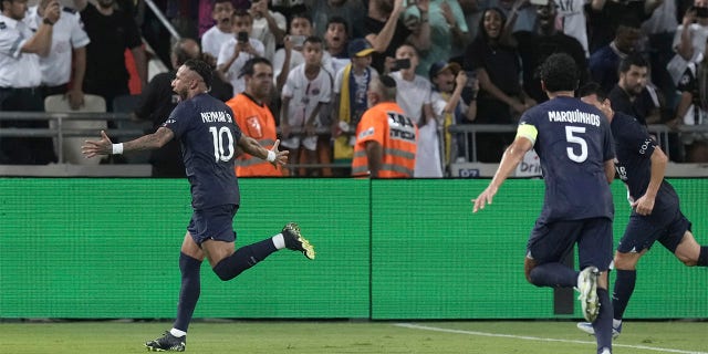 PSG's Neymar (left) celebrates his side's second goal during the French Super Cup final football match between Nantes and Paris Saint-Germain at the Bloomfield Stadium in Tel Aviv, Israel, Sunday, July 31, 2022.
