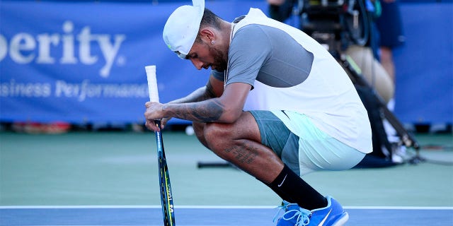 Nick Kyrgios pauses after victory