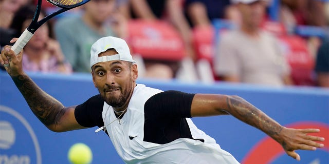 Nick Kyrgios, of Australia, prepares to hit a forehand to Marcos Giron, of the United States, at the Citi Open tennis tournament in Washington, Tuesday, Aug. 2, 2022.