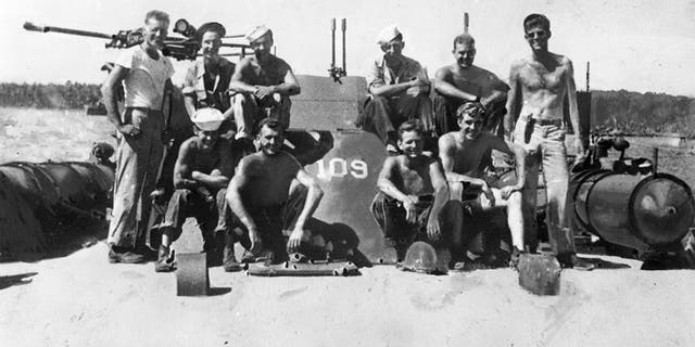 Lt. John F. Kennedy (standing, far right) and crewmen of the PT 109, Solomon Islands, 1943. Photograph in the John F. Kennedy Presidential Library and Museum, Boston.