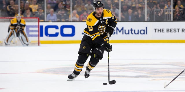 Patrice Bergeron of the Boston Bruins skates against the Carolina Hurricanes during the first period in Game 6 of the first round of the 2022 Stanley Cup playoffs at the TD Garden May 12, 2022, in Boston.