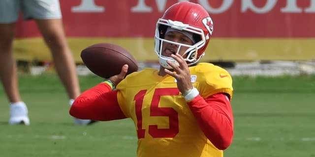 Kansas City Chiefs quarterback Patrick Mahomes drops back to pass during training camp on Aug. 7, 2022, at Missouri Western State University in St. Joseph, Missouri.