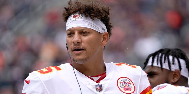 Kansas City Chiefs quarterback Patrick Mahomes listens to the play calls during the Bears preseason game, Aug. 13, 2022, in Chicago.