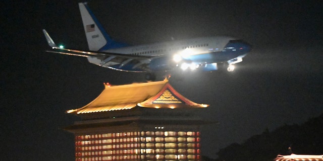A U.S. military aircraft with House Speaker Nancy Pelosi on board prepares to land at Sungshan Airport in Taipei, Taiwan, on Aug. 2, 2022.