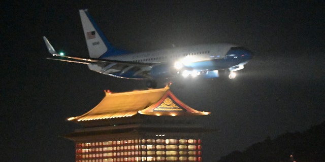 A U.S. military aircraft with House Speaker Nancy Pelosi on board prepares to land at Sungshan Airport in Taipei, Taiwan, on Aug. 2, 2022.