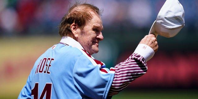 Former Philadelphia Phillies player Pete Rose tips his hat to fans during an alumni day event before a game between the Philadelphia Phillies and the Washington Nationals, Aug. 7, 2022, in Philadelphia.