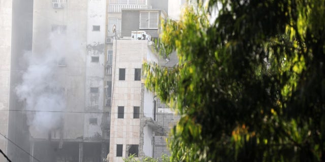 The aftermath of an attack on a building where IDF jets targeted a senior terrorist leader in Gaza, Friday.