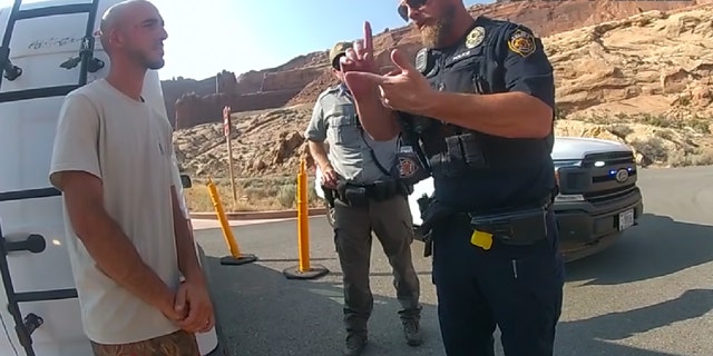 Moab Police Officer Eric Pratt, in bodycam footage released by investigators, is seen speaking to Brian Laundrie on Aug. 12, 2021.
