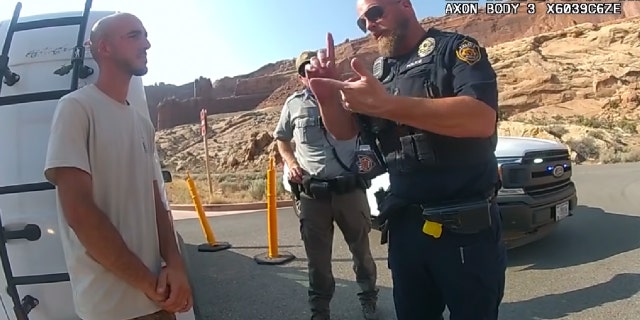 Moab Police Officer Eric Pratt, in bodycam footage released by investigators, is seen speaking to Brian Laundrie on Aug. 12, 2021.