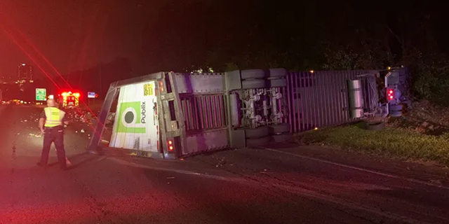 An overturned Publix semi-trailer truck caused major delays on Interstate 285.