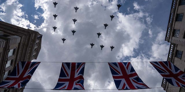 FILE: Royal Air Force aircraft perform a flypast on June 2, 2022, in London, England. 