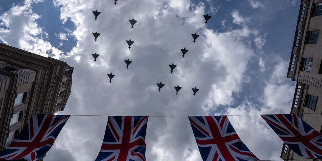 FILE: Royal Air Force aircraft perform a flypast on June 2, 2022, in London, England. 