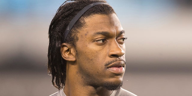 Robert Griffin III, #10 of the then-Washington Redskins, looks on prior to the game against the Philadelphia Eagles on December 26, 2015 at Lincoln Financial Field in Philadelphia.