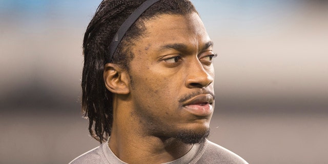 Robert Griffin III, #10 of the then-Washington Redskins, looks on prior to the game against the Philadelphia Eagles on December 26, 2015 at Lincoln Financial Field in Philadelphia.