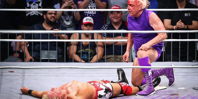 Ric Flair bloodied up during "Ric Flair's Last Match" at Nashville Municipal Auditorium on July 31, 2022 in Nashville, Tennessee.