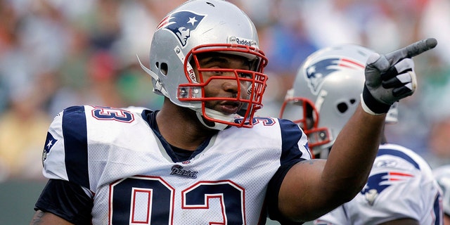 New England Patriots' Richard Seymour reacts after sacking New York Jets quarterback Brett Favre in East Rutherford, New Jersey, on Sept. 14, 2008.