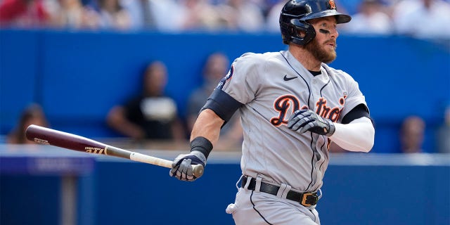 Robbie Grossman #8 of the Detroit Tigers hits a single against the Toronto Blue Jays in the fifth inning during their MLB game at the Rogers Centre on July 30, 2022 in Toronto, Ontario, Canada.