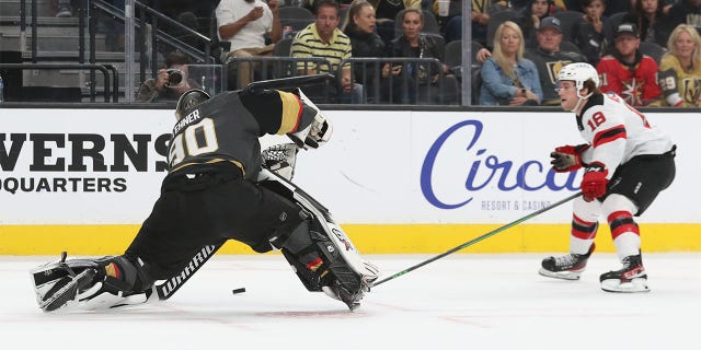 Robin Lehner #90 of the Vegas Golden Knights clears the puck during the first period of a game against the New Jersey Devils at T-Mobile Arena on April 18, 2022 en las vegas, Nevada.