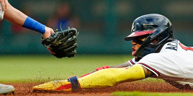 Ronald Acuña Jr. of the Atlanta Braves is tagged out as he tries to steal second base in the team's first inning of the team's game against the New York Mets on Tuesday, August 16, 2022 in Atlanta.