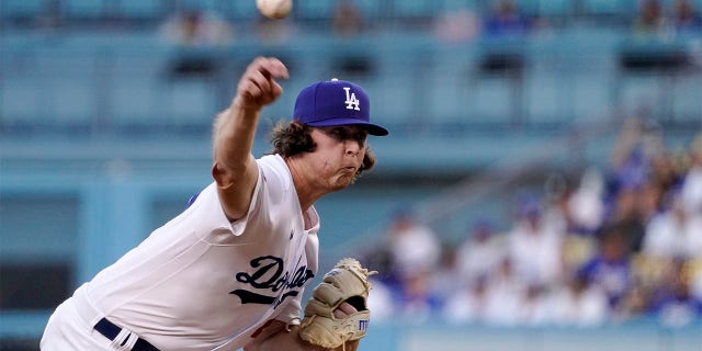 Los Angeles Dodgers starting pitcher Ryan Pepiot throws to the plate during the first inning of a baseball game against the Minnesota Twins Wednesday, Aug. 10, 2022, in Los Angeles.