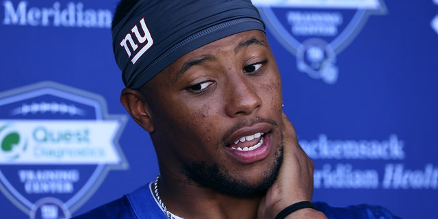 Running back Saquon Barkley of the New York Giants talks to the media after mandatory minicamp at Quest Diagnostics Training Center, June 8, 2022, in East Rutherford, New Jersey.