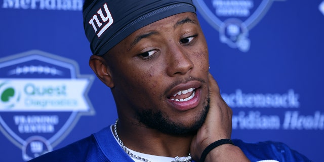 Running back Saquon Barkley of the New York Giants talks to the media after mandatory minicamp at Quest Diagnostics Training Center, June 8, 2022, in East Rutherford, New Jersey.