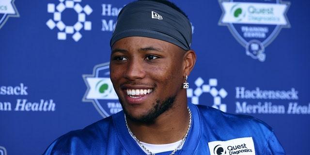 Running back Saquon Barkley, #26 of the New York Giants, talks to the media after mandatory minicamp at Quest Diagnostics Training Center on June 8, 2022 in East Rutherford, New Jersey.
