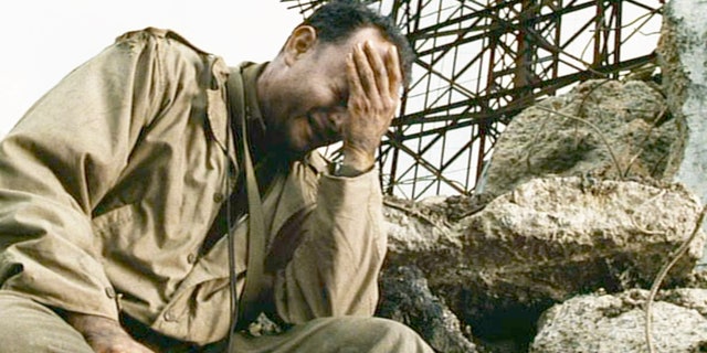 In this scene from the movie "Saving Private Ryan," directed by Steven Spielberg, Tom Hanks (as Captain John H. Miller) takes a moment alone. The powerful wartime drama inspired WWII veteran Jimmy Palermo to open up, finally, to his kids about his horrific wartime experiences.