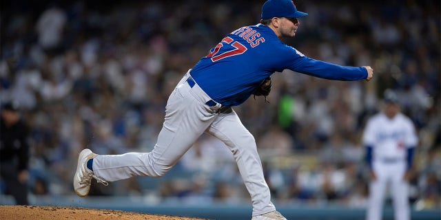 Chicago Cubs relief pitcher Scott Effross (57) faces the Los Angeles Dodgers at Dodger Stadium on July 7, 2022 in Los Angeles, CA.
