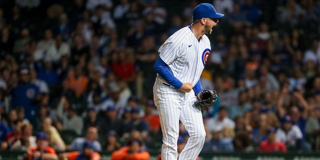 Scott Effross #57 of the Chicago Cubs reacts after striking out the side in the eighth inning during game two of a doubleheader between the New York Mets and the Chicago Cubs at Wrigley Field on July 16, 2022 in Chicago, Illinois. 