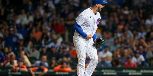 Scott Effross #57 of the Chicago Cubs reacts after striking out the side in the eighth inning during game two of a doubleheader between the New York Mets and the Chicago Cubs at Wrigley Field on July 16, 2022 in Chicago, Illinois.