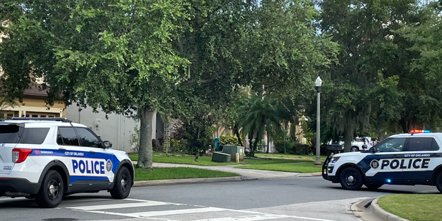 Orlando police presence outside house where family of five died in murder suicide.