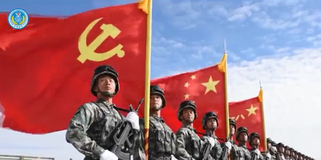 Chinese soldiers with Chinese flag in the background