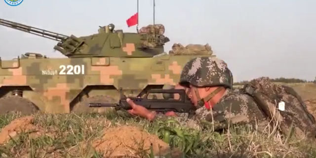 Screenshot of a soldier with the Chinese military in a Chinese People's Liberation Army propaganda video posted on Chinese state media.