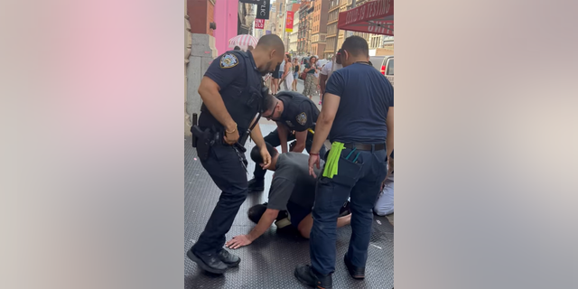 Ro Malabanan wrestled a man to the ground who was allegedly attacking people in New York City on July 27, 2022.