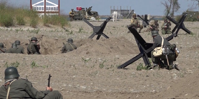 Each day, a nearly hour-long reenactment commemorates D-Day: the military operation where the Allied forces stormed the beaches of Normandy in 1944.