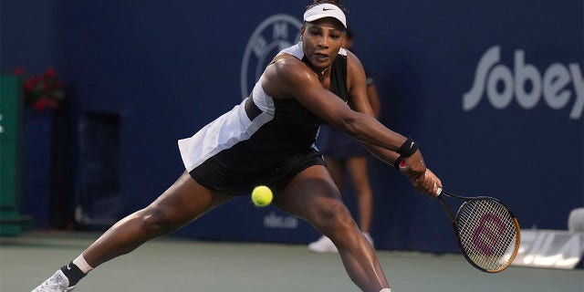 Serena Williams runs down a shot against Belinda Bencic of Switzerland during the National Bank Open tennis tournament on August 10, 2022 in Toronto.