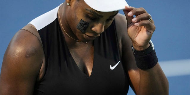 Serena Williams reacts after losing to Belinda Bencic of Switzerland at the National Bank Open tennis tournament on August 10, 2022 in Toronto.