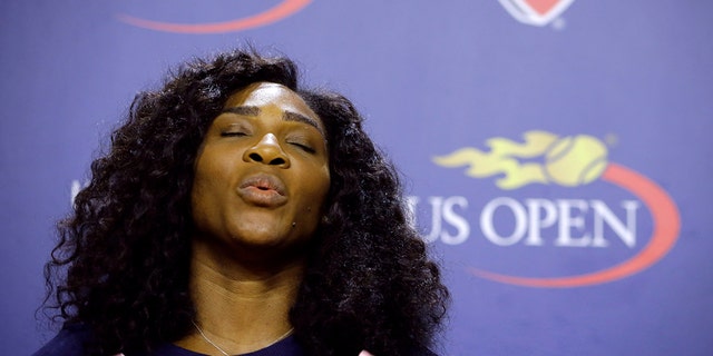 U.S. Open tennis defending champion Serena Williams gestures during a press conference at the USTA Billie Jean King National Tennis Center in New York, Thursday, Aug. 27, 2015.