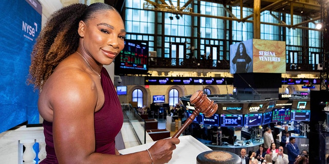 In this photo provided by the New York Stock Exchange, Serena Williams, founder of Serena Ventures, poses for a photo on the NYSE bell podium during opening bell ceremonies, Friday, Aug. 26, 2022.