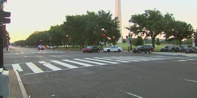 Police detained three individuals after shots were fired in Washington, D.C., near the National Mall, Aug. 19, 2022.